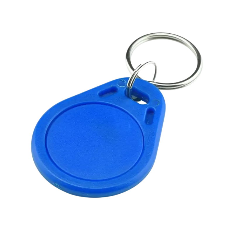 13.56MHz RFID IC Key Tag A compact blue 13.56MHz RFID IC key tag featuring a teardrop-shaped waterproof ABS plastic casing and a metal key ring attachment.