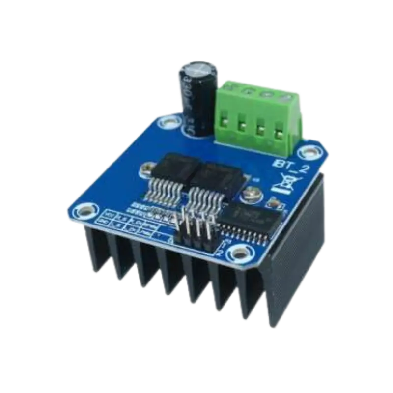 BTS7960 High-power blue HW-039 motor driver board showing a massive black aluminum cooling fins block fixed underneath, an integrated 4-position green terminal block alongside an electro-filtering capacitor, two prominent central half-bridge ICs, and an 8-pin control connector logic bank.