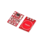 Miniature red double-sided printed circuit board displaying a large circular capacitive touch pad zone labeled 'TOUCH' on the front, and the tiny multi-pin TTP223 IC chip along with labeled solder configuration blocks 'A' and 'B' on the reverse side.