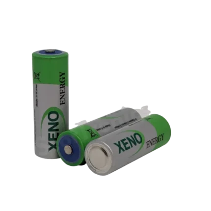 Xeno Energy XL-100F 3.6V A-size industrial primary lithium thionyl chloride battery on a solid workspace backdrop.