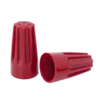 An assortment of multi-colored flame-retardant electrical wire nut connectors showing their ribbed outer shells and a hollow bottom revealing the interior tapered steel spring coils.