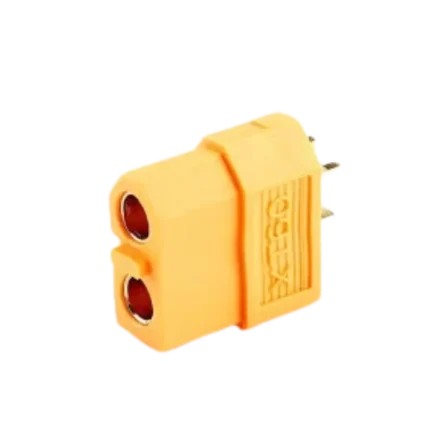 A standalone yellow high-temperature nylon XT60 female connector displaying two internal gold-plated brass sleeve ports and an asymmetric, keyed anti-reversal profile.