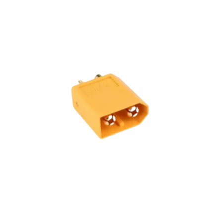 A standalone yellow high-temperature nylon XT60 male connector displaying two prominent internal gold-plated solid brass pins and an asymmetric, keyed anti-reversal profile.
